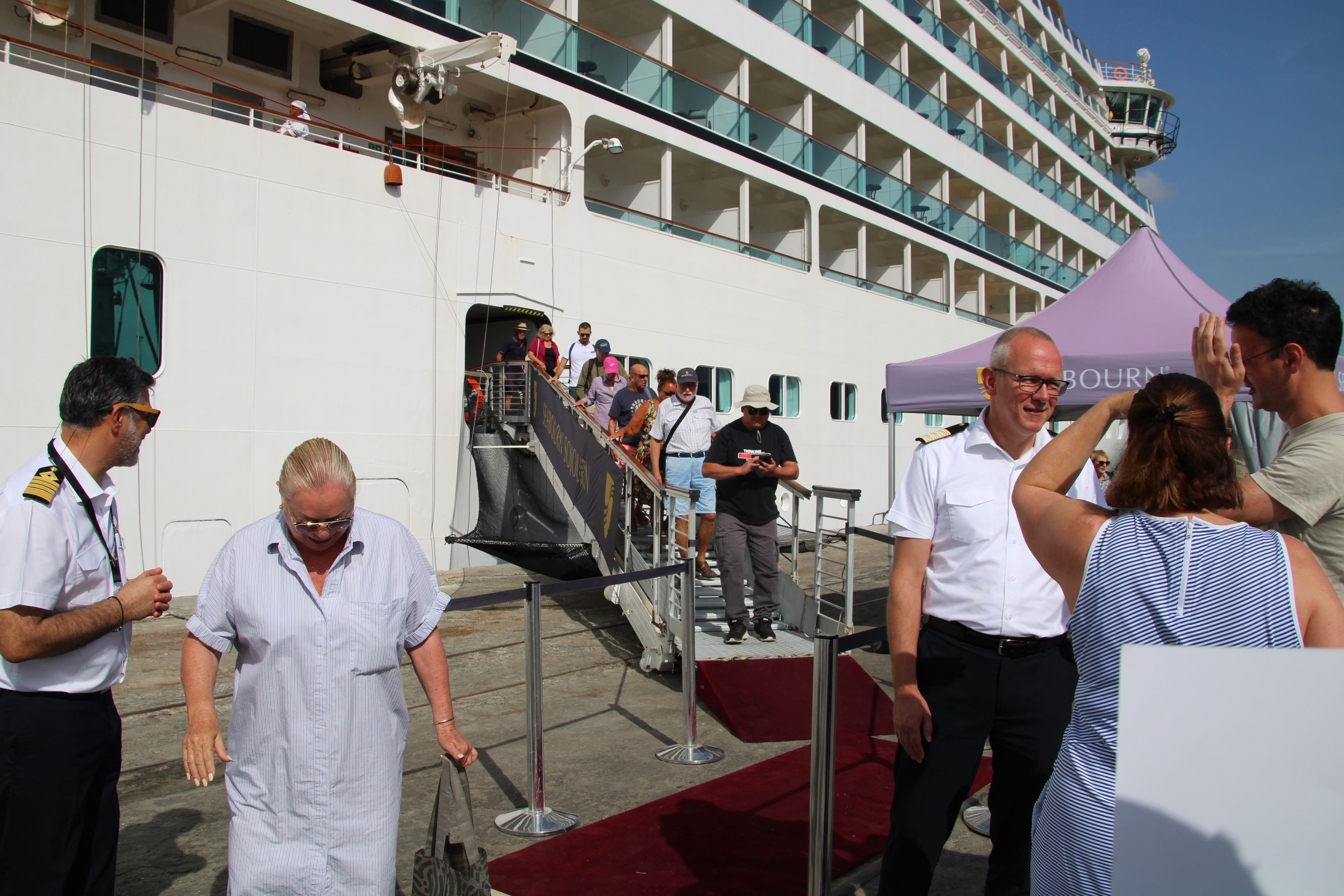 Cruise passengers disembarking for shore excursions in Lomé