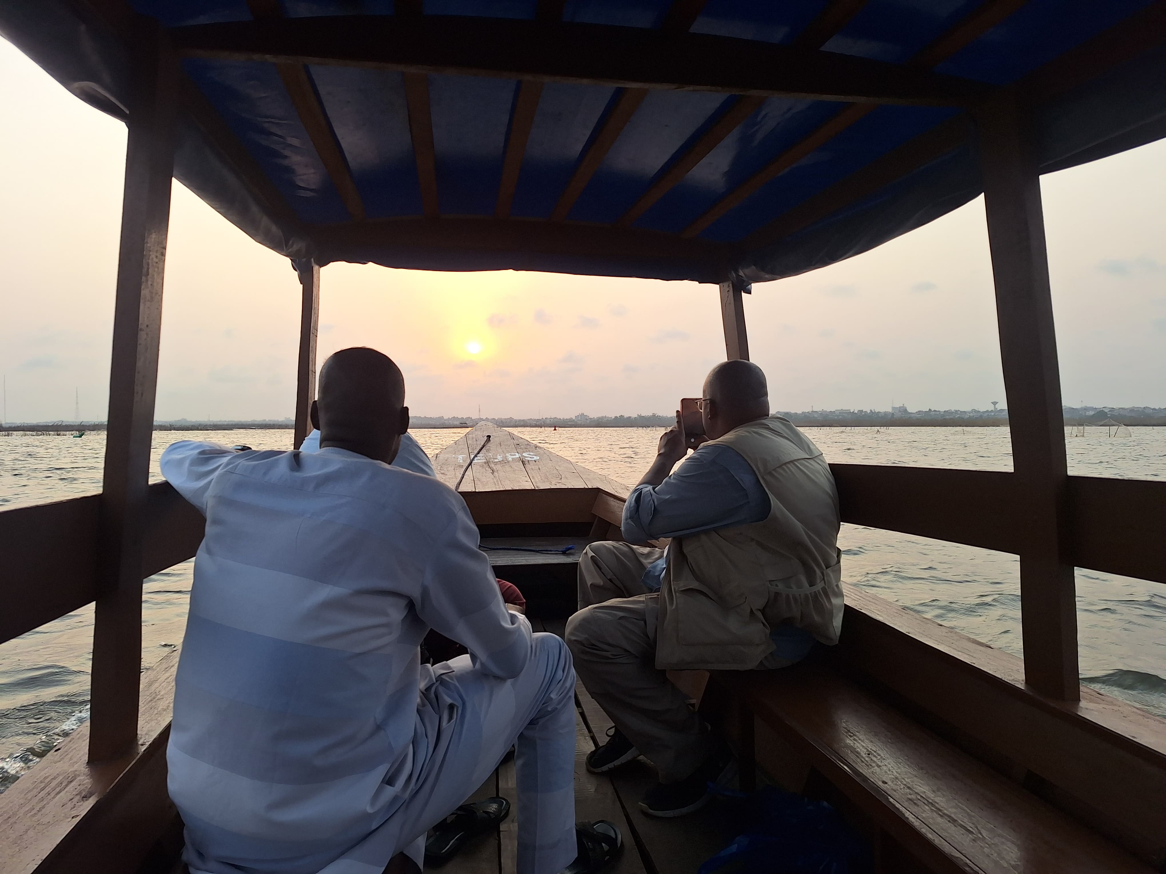 A visit on ganvie stilt village during sunset