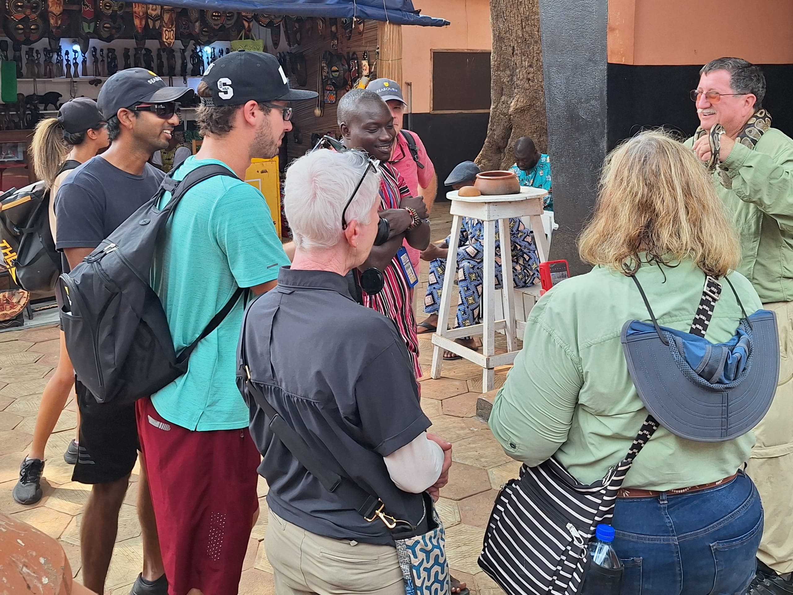 A group of tourist from cruise line ship during Benin city tour, visiting ouidah, cotonou and Ganvie